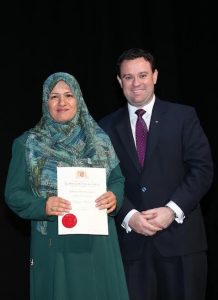 Dunya Alruhami (Iraq) with Minister Ayres for Higher Education Award.