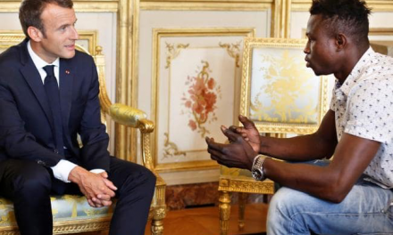Muslim refugee rescues dangling child in Paris