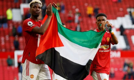 Manchester United duo Paul Pogba and Amad Diallo hold up Palestinian flag after Premier League draw