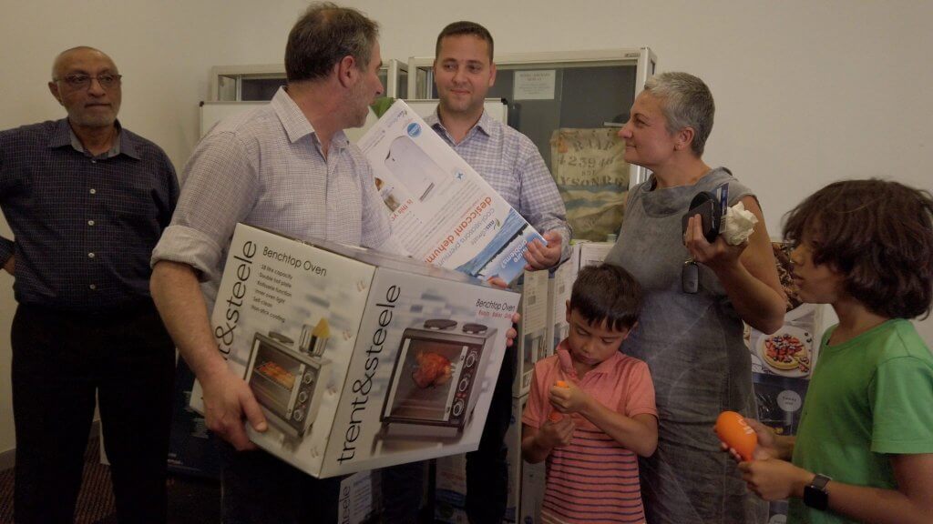Jihad Dib, MP and Clr Bilal El-Hayek distributing donations to Resilient Lismore (Helping Hands) 2
